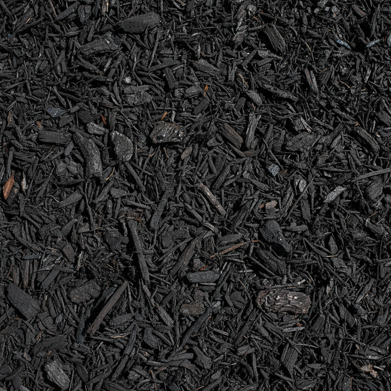 Black dyed shredded hardwood landscape mulch - top down view